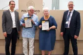Broos Baanders & Sally Scarlett receiving their awards from András Munkácsy and Hermann Maier at ETC 2022, Milan