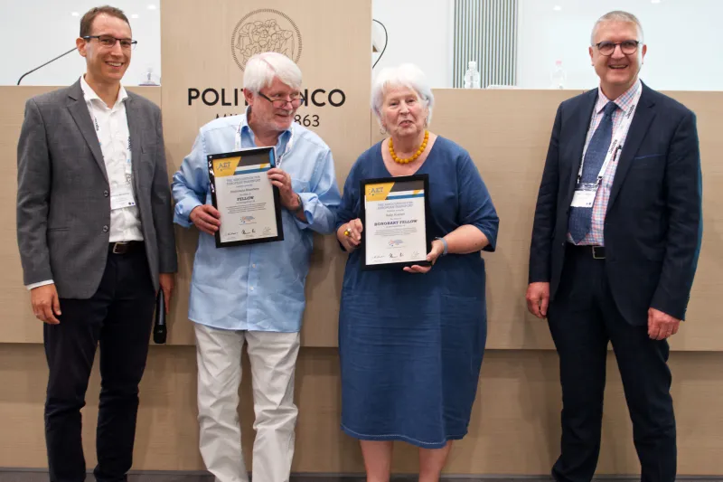 Broos Baanders & Sally Scarlett receiving their awards from András Munkácsy and Hermann Maier at ETC 2022, Milan